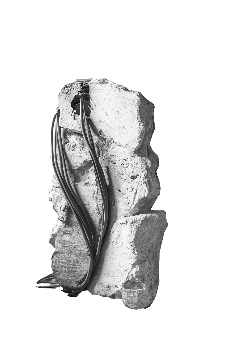 Monochrome study of a technological object enclosed in a mineral-like form