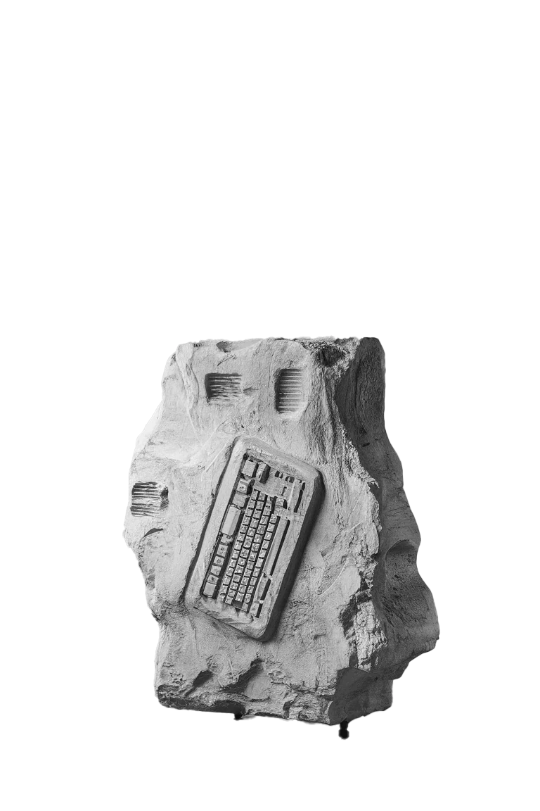 Monochrome study of a fossilised electronic device